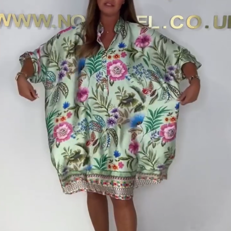 Loose dress with V-neck and half button placket with floral pattern